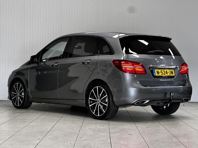 Mercedes-Benz B-KLASSE 180 Ambition/ Automaat/ Trekhaak/ Apple + Android/ Sportstoelen/ Keyless-GO/ 18'' LMV/ PDC V+A/ LED Koplampen/ Bluetooth/ Extra getint glas/ Half-Leder.