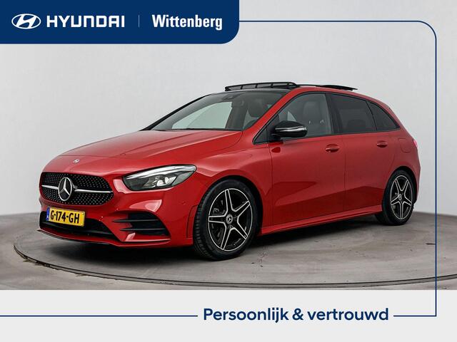 Mercedes-Benz B-KLASSE 180 Business Solution AMG | Schuif/kanteldak | Achteruitrij camera | Cruise control | Stoelverwarming | Navigatie |