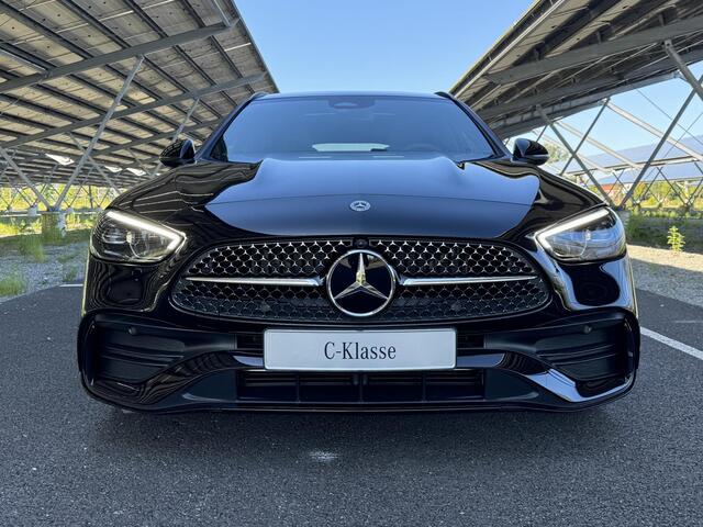 Mercedes-Benz C-KLASSE 180 AMG Line | Panoramadak | Massage stoelen | Stoelverwarming/ventilatie | Sfeerverlichting | Parkeercamera | Parfumering |