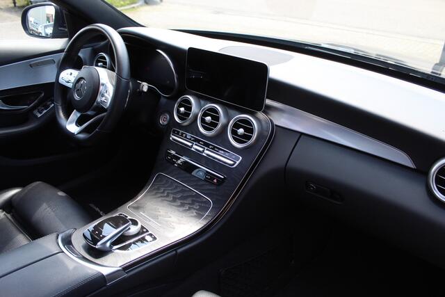Mercedes-Benz C-KLASSE 180 Business Solution AMG Automaat/Panoramadak/Navigatie/Apple carplay/Virtueel dashboard/Multibeam LED/Cruise control/Climate control/Lederen bekleding/Stoelverwarming/Elektrisch verstelbare stoelen/Spiegels inklapbaar/Achteruitrijcamera/Parkeersensoren/