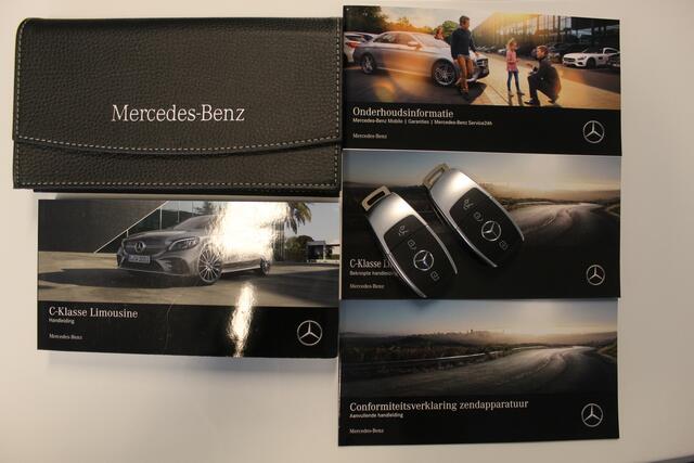 Mercedes-Benz C-KLASSE 180 Business Solution AMG Automaat/Panoramadak/Navigatie/Apple carplay/Virtueel dashboard/Multibeam LED/Cruise control/Climate control/Lederen bekleding/Stoelverwarming/Elektrisch verstelbare stoelen/Spiegels inklapbaar/Achteruitrijcamera/Parkeersensoren/