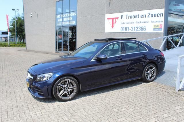 Mercedes-Benz C-KLASSE 180 Business Solution AMG Automaat/Panoramadak/Navigatie/Apple carplay/Virtueel dashboard/Multibeam LED/Cruise control/Climate control/Lederen bekleding/Stoelverwarming/Elektrisch verstelbare stoelen/Spiegels inklapbaar/Achteruitrijcamera/Parkeersensoren/