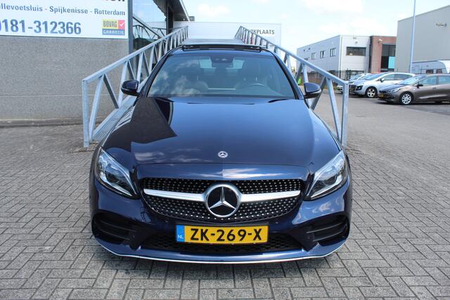 Mercedes-Benz C-KLASSE 180 Business Solution AMG Automaat/Panoramadak/Navigatie/Apple carplay/Virtueel dashboard/Multibeam LED/Cruise control/Climate control/Lederen bekleding/Stoelverwarming/Elektrisch verstelbare stoelen/Spiegels inklapbaar/Achteruitrijcamera/Parkeersensoren/