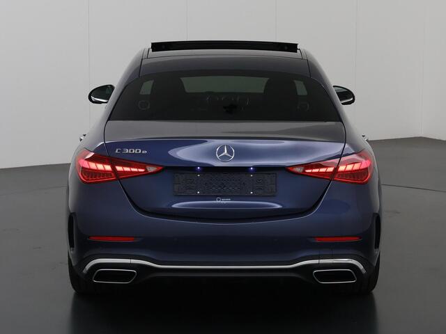 Mercedes-Benz C-KLASSE 300 e AMG Line Panoramadak | Rijsassistentiepakket | Trekhaak | 360gr camera | Digital light | Keyless go