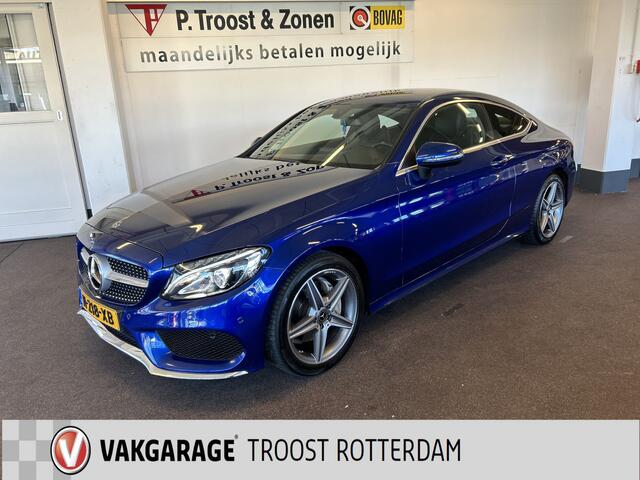 Mercedes-Benz C-KLASSE Coupé 180 AMG Exclusive | Automaat | Lederen bekleding | Dealer onderhouden | Adaptief onderstel | Achteruitrijcamera | Cruise control | Climate control | Houtafwerking interieur