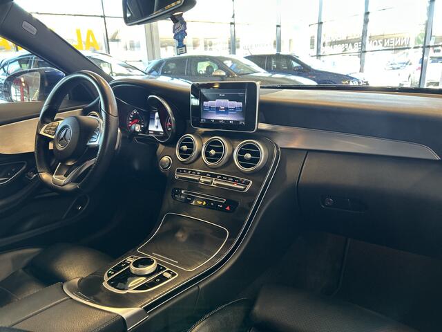 Mercedes-Benz C-KLASSE Coupé 180 AMG Exclusive | Automaat | Lederen bekleding | Dealer onderhouden | Adaptief onderstel | Achteruitrijcamera | Cruise control | Climate control | Houtafwerking interieur
