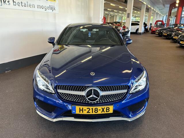Mercedes-Benz C-KLASSE Coupé 180 AMG Exclusive | Automaat | Lederen bekleding | Dealer onderhouden | Adaptief onderstel | Achteruitrijcamera | Cruise control | Climate control | Houtafwerking interieur