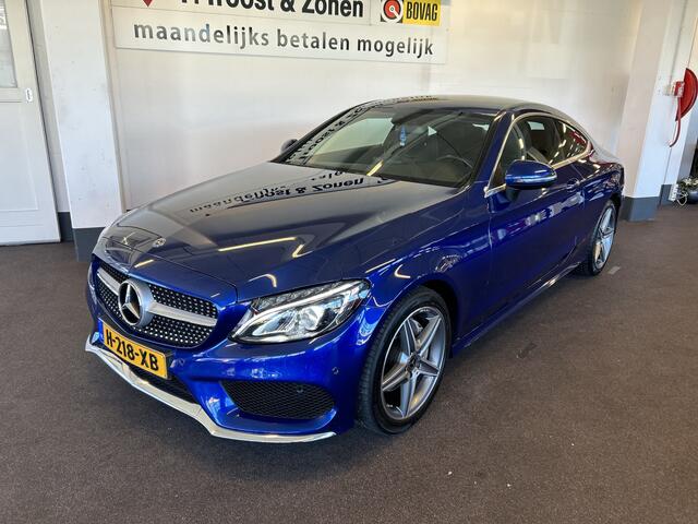 Mercedes-Benz C-KLASSE Coupé 180 AMG Exclusive | Automaat | Lederen bekleding | Dealer onderhouden | Adaptief onderstel | Achteruitrijcamera | Cruise control | Climate control | Houtafwerking interieur