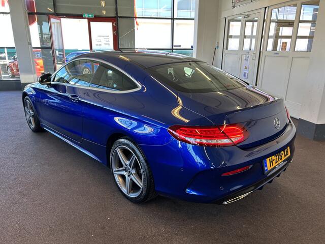 Mercedes-Benz C-KLASSE Coupé 180 AMG Exclusive | Automaat | Lederen bekleding | Dealer onderhouden | Adaptief onderstel | Achteruitrijcamera | Cruise control | Climate control | Houtafwerking interieur