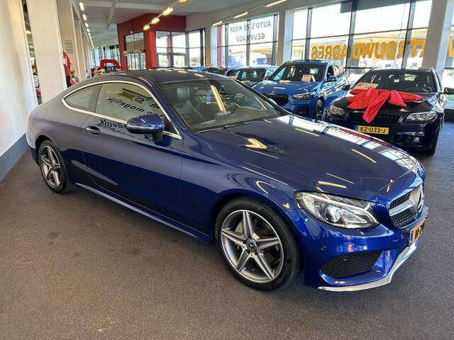 Mercedes-Benz C-KLASSE Coupé 180 AMG Exclusive | Automaat | Lederen bekleding | Dealer onderhouden | Adaptief onderstel | Achteruitrijcamera | Cruise control | Climate control | Houtafwerking interieur