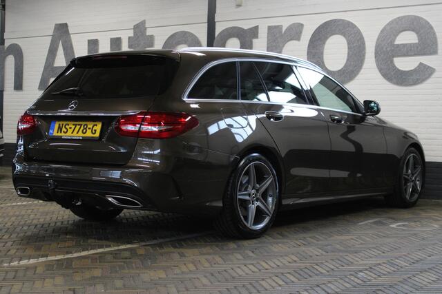 Mercedes-Benz C-KLASSE Estate 180 AMG Sport Edition | Incl. 12 maanden garantie | Automaat | Afneembare trekhaak | Navigatie | Cruise control | Climate control | Vol leder | Stoelverwarming | Zwarte hemel | 18'' LM | Parkeersensoren |