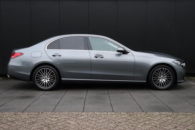 Mercedes-Benz C-KLASSE 180 AMG Line | LEDER | MEMORY | PANO | STOELVERW. | TREKHAAK | 360° CAMERA | NAVI | CRUISE |