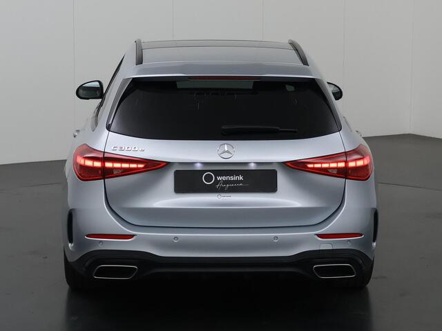 Mercedes-Benz C-KLASSE 300 e 4MATIC AMG Line | Night | Panoramadak | 360 graden camera | Dakrails |