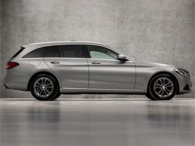 Mercedes-Benz C-KLASSE Estate 180 AMG Edition 1 Sport 157Pk Automaat (PANORAMADAK, NAVIGATIE, STOELVERWARMING, GETINT GLAS, LEDER, SPORTSTOELEN, ELEK ACHTERKLEP, CRUISE CONTROL, NIEUWSTAAT)