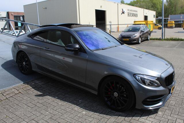 Mercedes-Benz C-KLASSE Coupé 200 Prestige AMG Automaat/Panoramadak/Navigatie/Cruise control/Voorstoelen elektrisch verstelbaar+verwarmbaar/Kleppensysteem/Buitenpiegels inklapbaar/360 camera/Led koplampen adaptief/Alarm klasse 3/Parkeersensoren