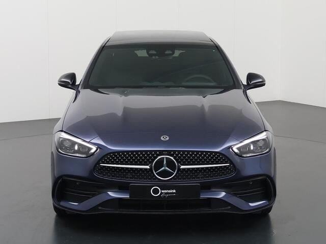 Mercedes-Benz C-KLASSE 300 e AMG Line | Rijassistentiepakket | Panoramadak | Digital Light | Head-Up Display | Trekhaak | Sfeerverlichting | elektrisch verstelbare voorstoelen | Nightpakket
