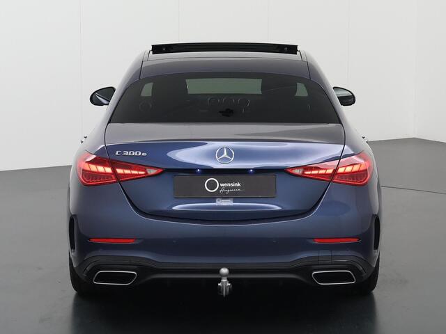 Mercedes-Benz C-KLASSE 300 e AMG Line | Rijassistentiepakket | Panoramadak | Digital Light | Head-Up Display | Trekhaak | Sfeerverlichting | elektrisch verstelbare voorstoelen | Nightpakket