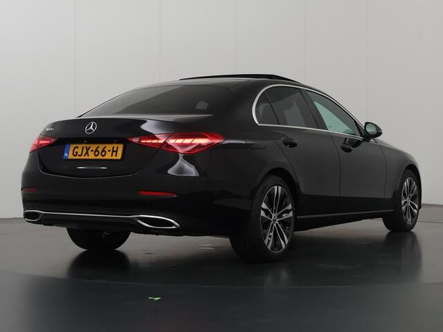 Mercedes-Benz C-KLASSE 300 e Luxury Line | Panorama-dak | Donkergetint glas | Electrische stoelen met geheugen | Sfeerverlichting