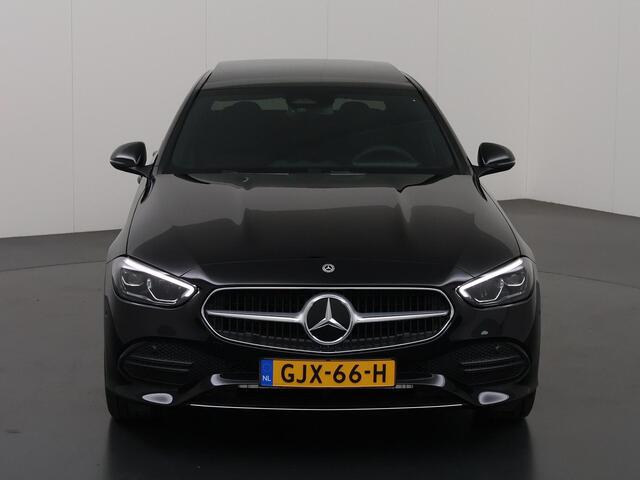 Mercedes-Benz C-KLASSE 300 e Luxury Line | Panorama-dak | Donkergetint glas | Electrische stoelen met geheugen | Sfeerverlichting