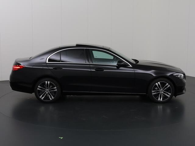 Mercedes-Benz C-KLASSE 300 e Luxury Line | Panorama-dak | Donkergetint glas | Electrische stoelen met geheugen | Sfeerverlichting