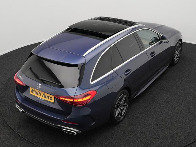 Mercedes-Benz C-KLASSE Estate 300 e AMG Line Plug in Hybrid Dealer O.H. PHEV | Panodak | Lederen Sportstoelen Verwarmd | Adaptive Cruise | Apple Carplay | Sfeerverlichting | MBUX | Navigatie | Camera | DAB | Virtual |