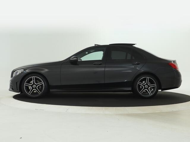 Mercedes-Benz C-KLASSE 180 Business Solution AMG | AMG Line | Night Pakket | Panorama Schuif-Kanteldak | Lederen Bekleding | Dodehoek Assist | Digitaal Dashboard. Inclusief 24 maanden MB Certified garantie voor Europa.