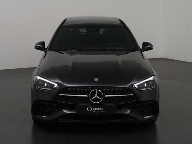 Mercedes-Benz C-KLASSE 180 Estate Business Solution AMG AMG Line | Panoramadak | Trekhaak | Digital Light | Memory stoelen | Actieve dodehoek | 360 camera | Trekhaak | Night pakket | Apple carplay