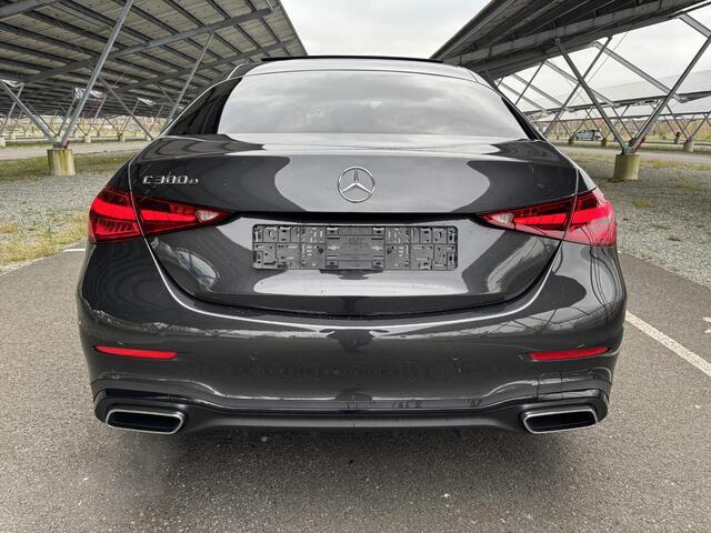 Mercedes-Benz C-KLASSE 300 e star Edition AMG Line Plus | Night | Panoramadak | Burmester | Massagestoelen | Stoelverwarming/ventilatie | 360 camera | Trekhaak | Sfeerverlichting |