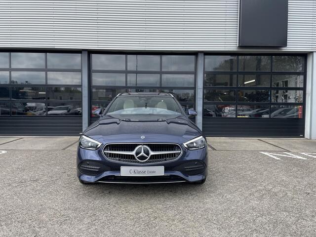 Mercedes-Benz C-KLASSE Estate 300 e Luxury Line | Beige Leder | Winter Pakket | Panoramadak | Trekhaak | DIGITAL LIGHT | DISTRONIC Afstandsassistent | 360° Camera | Stuurverwarming | Apple CarPlay | Android Auto | Elektrisch Verstelbare Stoelen + Memory