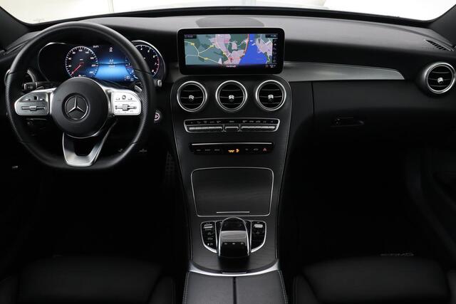 Mercedes-Benz C-KLASSE 180 AMG | Panoramadak | Leder | Stoelverwarming | Carplay | Matrix LED | Sfeerverlichting | Camera | Navigatie | Side Assist | Climate control | Park Assist