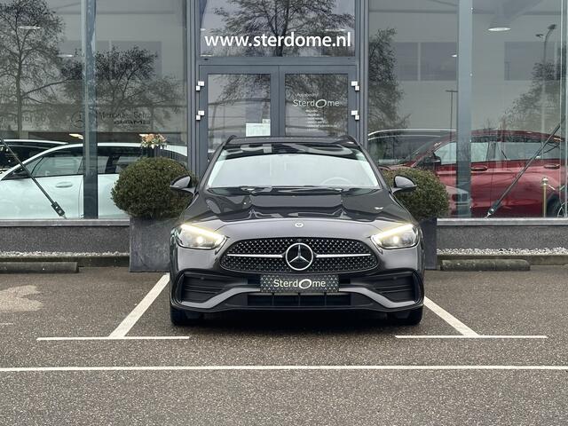Mercedes-Benz C-KLASSE Estate 300 e AMG Line l Distronic l MBUX l Stoelverwarming l DIGITAL LIGHT l Night pakket l 360 gr Camera l Smart phone integratie l Niveau regeling l Sfeerverlichting l Wegklapbare Trekhaak l Multicontourstoelen l Airco l LEDER ARTICO l