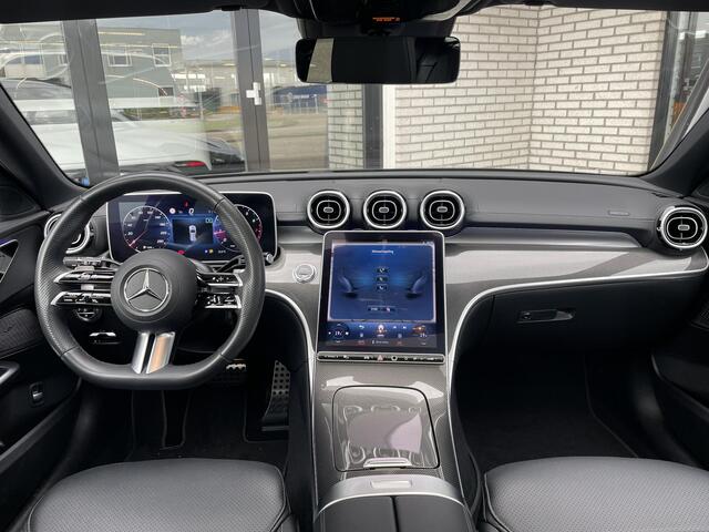 Mercedes-Benz C-KLASSE Estate 180 | Panoramadak | AMG | Night Pakket | Panoramadak | Elektrisch Verstelbare Stoelen + Memory | Dodehoekassistent | Apple CarPlay | Android Auto | Sfeerverlichting | Stoelverwarming