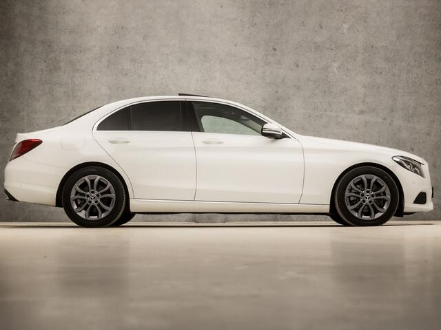 Mercedes-Benz C-KLASSE 200 Sport Premium Plus 184Pk Automaat (SCHUIFDAK, NAVIGATIE, SFEERVERLICHTING, GETINT GLAS, LEDER, ELEK STOELVERWARMING, SPORTSTOELEN, CRUISE, LED KOPLAMPEN, NIEUWSTAAT)