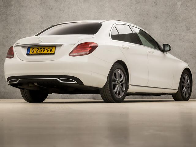 Mercedes-Benz C-KLASSE 200 Sport Premium Plus 184Pk Automaat (SCHUIFDAK, NAVIGATIE, SFEERVERLICHTING, GETINT GLAS, LEDER, ELEK STOELVERWARMING, SPORTSTOELEN, CRUISE, LED KOPLAMPEN, NIEUWSTAAT)