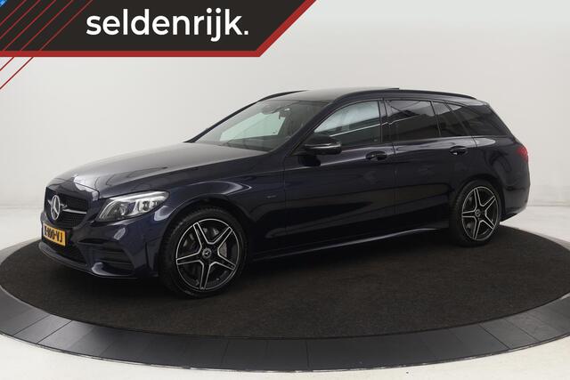 Mercedes-Benz C-KLASSE 300e AMG | Panoramadak | Stoelverwarming | 360 camera | Trekhaak | Carplay | Dodehoek detectie | Matrix LED | Navigatie | Half leder