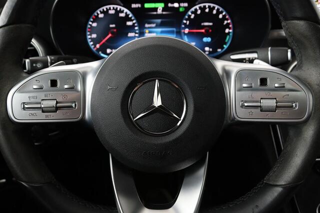 Mercedes-Benz C-KLASSE 300e AMG | Panoramadak | Stoelverwarming | 360 camera | Trekhaak | Carplay | Dodehoek detectie | Matrix LED | Navigatie | Half leder