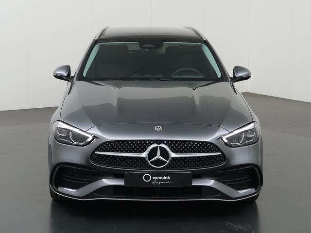 Mercedes-Benz C-KLASSE 300e Estate AMG Line | Panorama-schuifdak | Winter pakket | Getint glas | Stoelverwarming | Sfeerverlichting