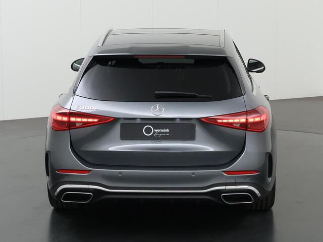 Mercedes-Benz C-KLASSE 300e Estate AMG Line | Panorama-schuifdak | Winter pakket | Getint glas | Stoelverwarming | Sfeerverlichting