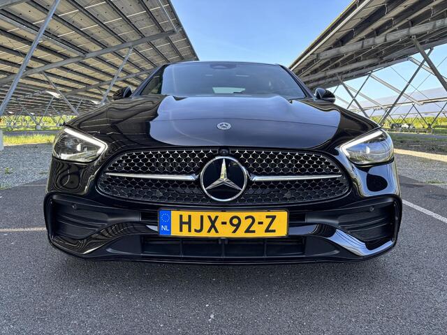 Mercedes-Benz C-KLASSE 180 AMG Line | Night | Panoramadak | Digital light | Memory stoelen | Sfeerverlichting | 360 camera |