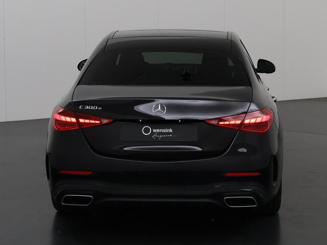 Mercedes-Benz C-KLASSE 300 e star Edition AMG Line | Night Pakket | Digital Light | Elektrisch verstelbare stoelen met geheugen | Panoramaschuifdak | 360 graden camera |