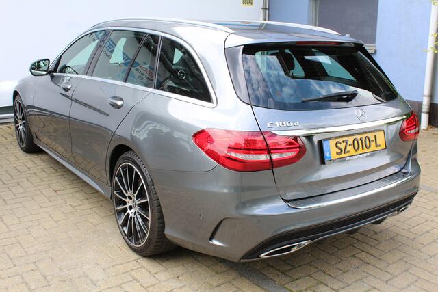 Mercedes-Benz C-KLASSE Estate 180 CDI Sport Edition Upgrade 19 inch | Incl. 12 maanden Garantie | Panorama dak | Achteruitrijcamera | Stoelverwarming | Parkeersensoren V+A | Cruise controle | Navigatie | Climate controle | LED Koplampen | Elektrische kofferbak klep | Keyless st