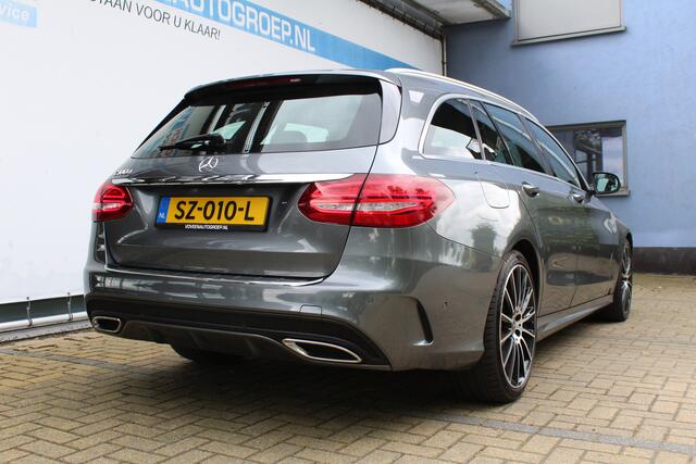 Mercedes-Benz C-KLASSE Estate 180 CDI Sport Edition Upgrade 19 inch | Incl. 12 maanden Garantie | Panorama dak | Achteruitrijcamera | Stoelverwarming | Parkeersensoren V+A | Cruise controle | Navigatie | Climate controle | LED Koplampen | Elektrische kofferbak klep | Keyless st
