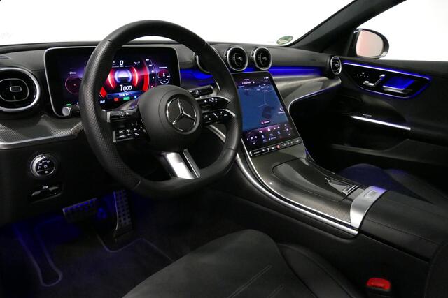 Mercedes-Benz C-KLASSE Estate 300 e AMG Line / C63S AMG Diffuser / Panamericana Grill / Panoramadak / Elektr. verstelbare voorstoelen (memory) / Digital Light / Ambienteverlichting / Stoelverwarming / Rondomzichtcamera / Luchtvering met niveauregeling (achteras) / Apple Carplay