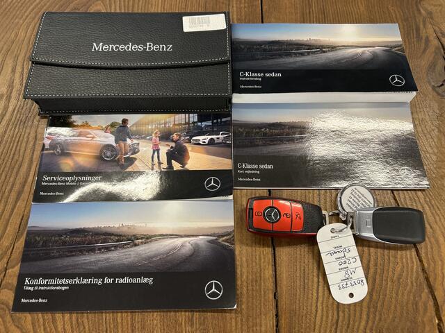 Mercedes-Benz C-KLASSE 200 Premium Plus Pack AMG Facelift | Cruise control | Climate control | Achteruitrijcamera | Adaptief onderstel | Navigatie | Sfeerverlichting | 19''INCH AMG | Stoelverwarming