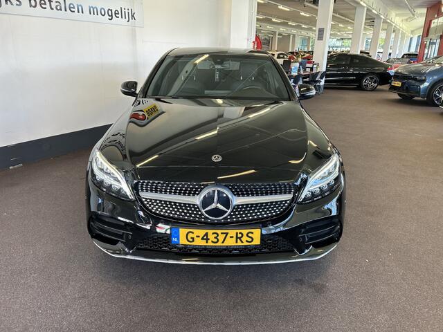Mercedes-Benz C-KLASSE 200 Premium Plus Pack AMG Facelift | Cruise control | Climate control | Achteruitrijcamera | Adaptief onderstel | Navigatie | Sfeerverlichting | 19''INCH AMG | Stoelverwarming