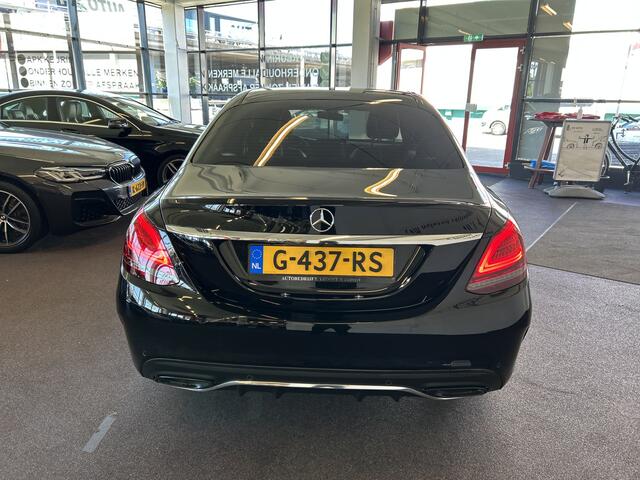Mercedes-Benz C-KLASSE 200 Premium Plus Pack AMG Facelift | Cruise control | Climate control | Achteruitrijcamera | Adaptief onderstel | Navigatie | Sfeerverlichting | 19''INCH AMG | Stoelverwarming