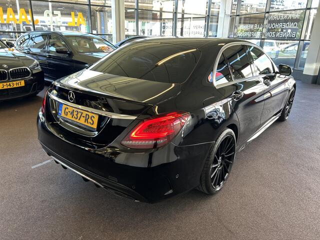 Mercedes-Benz C-KLASSE 200 Premium Plus Pack AMG Facelift | Cruise control | Climate control | Achteruitrijcamera | Adaptief onderstel | Navigatie | Sfeerverlichting | 19''INCH AMG | Stoelverwarming
