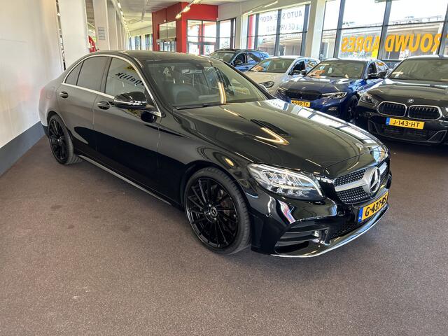 Mercedes-Benz C-KLASSE 200 Premium Plus Pack AMG Facelift | Cruise control | Climate control | Achteruitrijcamera | Adaptief onderstel | Navigatie | Sfeerverlichting | 19''INCH AMG | Stoelverwarming