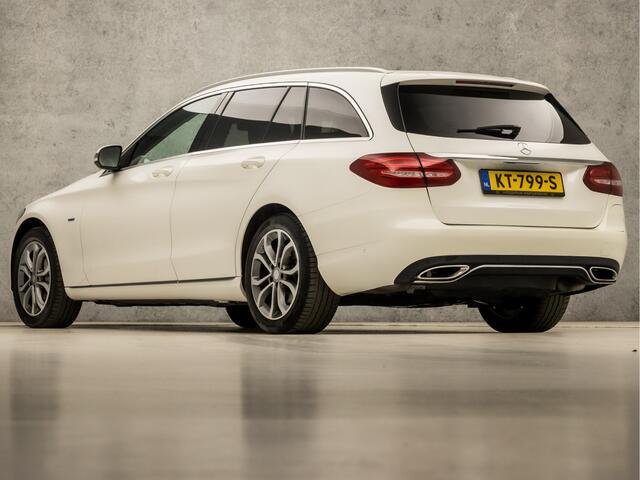 Mercedes-Benz C-KLASSE Estate 350 e Deluxe 279Pk Automaat (NAVIGATIE, CAMERA, LUCHTVERING, ADAPTIVE CRUISE, LEDER, ELEK SPORTSTOELEN, STOELVERWARMING, KEYLESS START, GETINT GLAS, NIEUWE APK, NIEUWSTAAT)