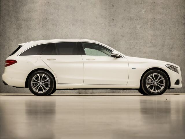 Mercedes-Benz C-KLASSE Estate 350 e Deluxe 279Pk Automaat (NAVIGATIE, CAMERA, LUCHTVERING, ADAPTIVE CRUISE, LEDER, ELEK SPORTSTOELEN, STOELVERWARMING, KEYLESS START, GETINT GLAS, NIEUWE APK, NIEUWSTAAT)
